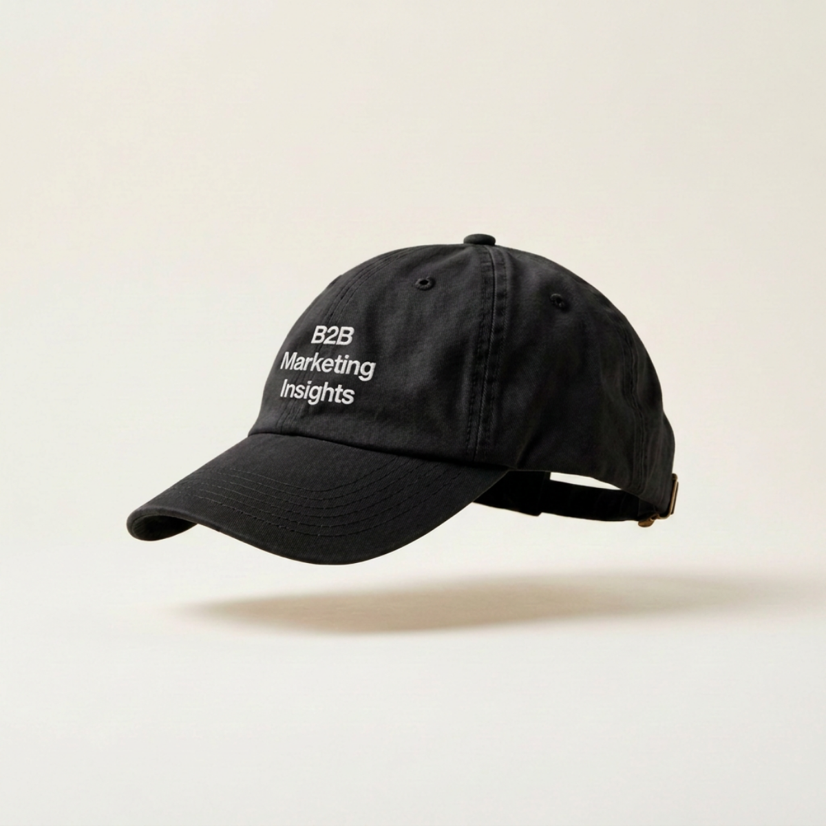 B2B Marketing Insights embroidered black six-panel cap on a plain white studio background