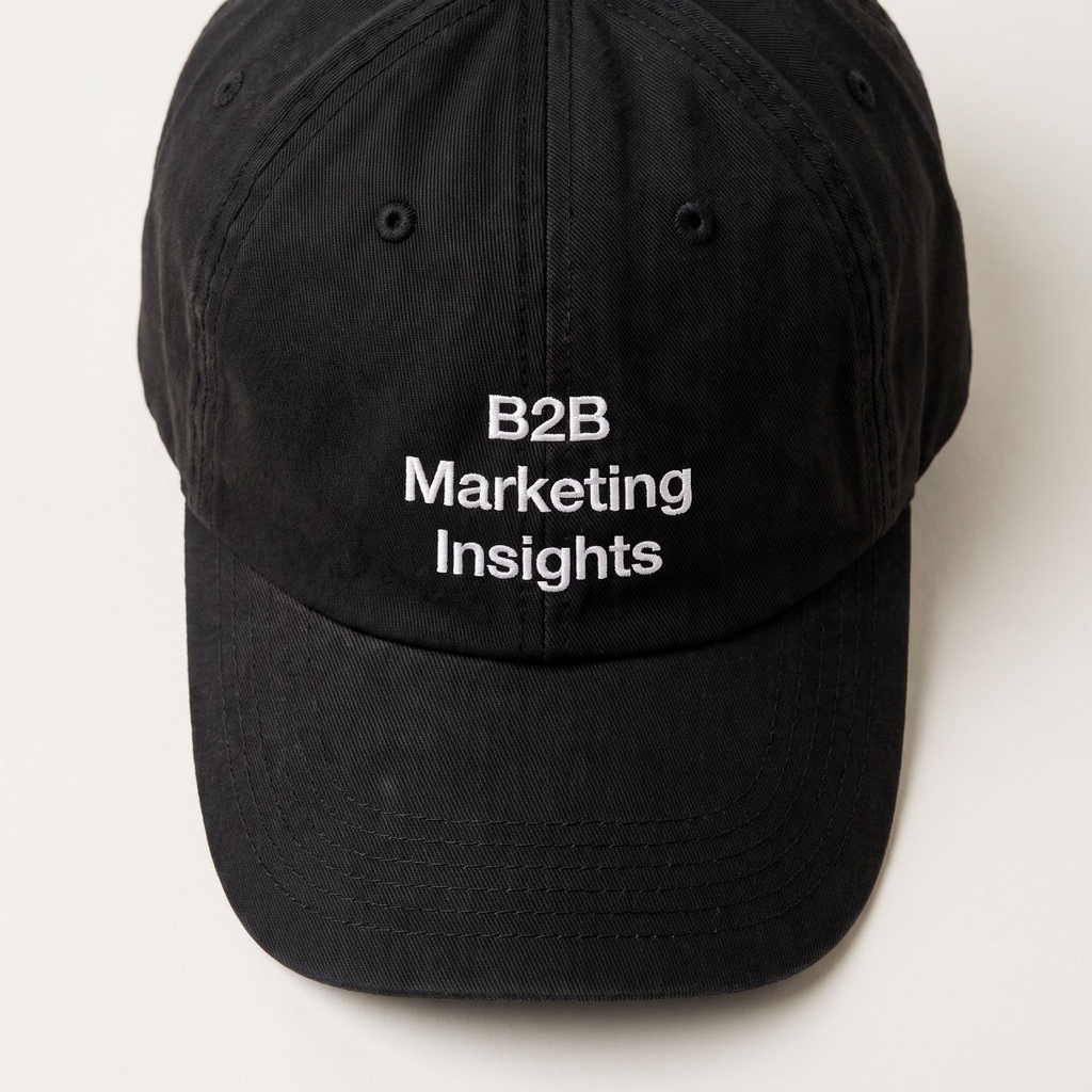 B2B Marketing Insights black cap at a three-quarter front angle against a cream backdrop